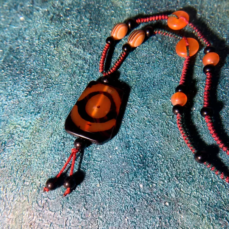Double-Eye Dzi Bead Necklace – Tibetan Amulet for Harmony, Protection & Spiritual Insight