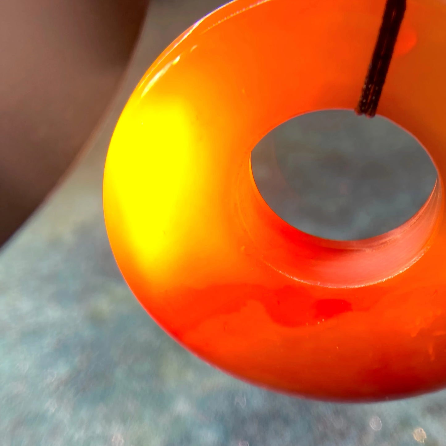 Tibetan Red Agate Buddha Dzi Peace Lock Pendant – Healing Donut Amulet for Protection, Vitality & Spiritual Harmony