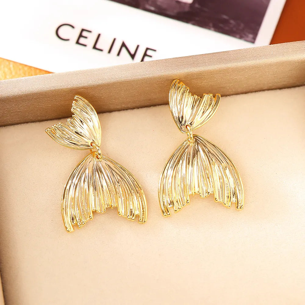 Spiritual Golden Fish Tail Studs – Bring Wealth, Harmony & Inner Flow